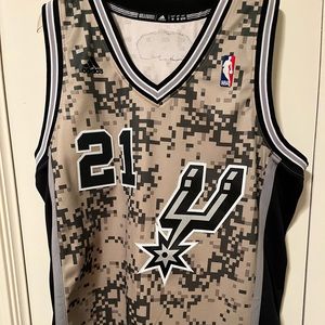 Tim Duncan Adidas swingman city edition camo jersey.